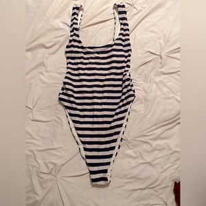 Aerie medium swimsuit. Blue and pink stripe. Side cleavage and high thigh